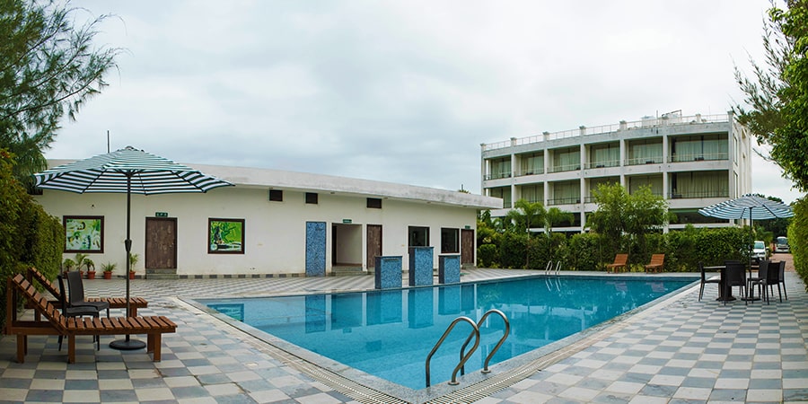 jim corbett resorts with swimming pool
